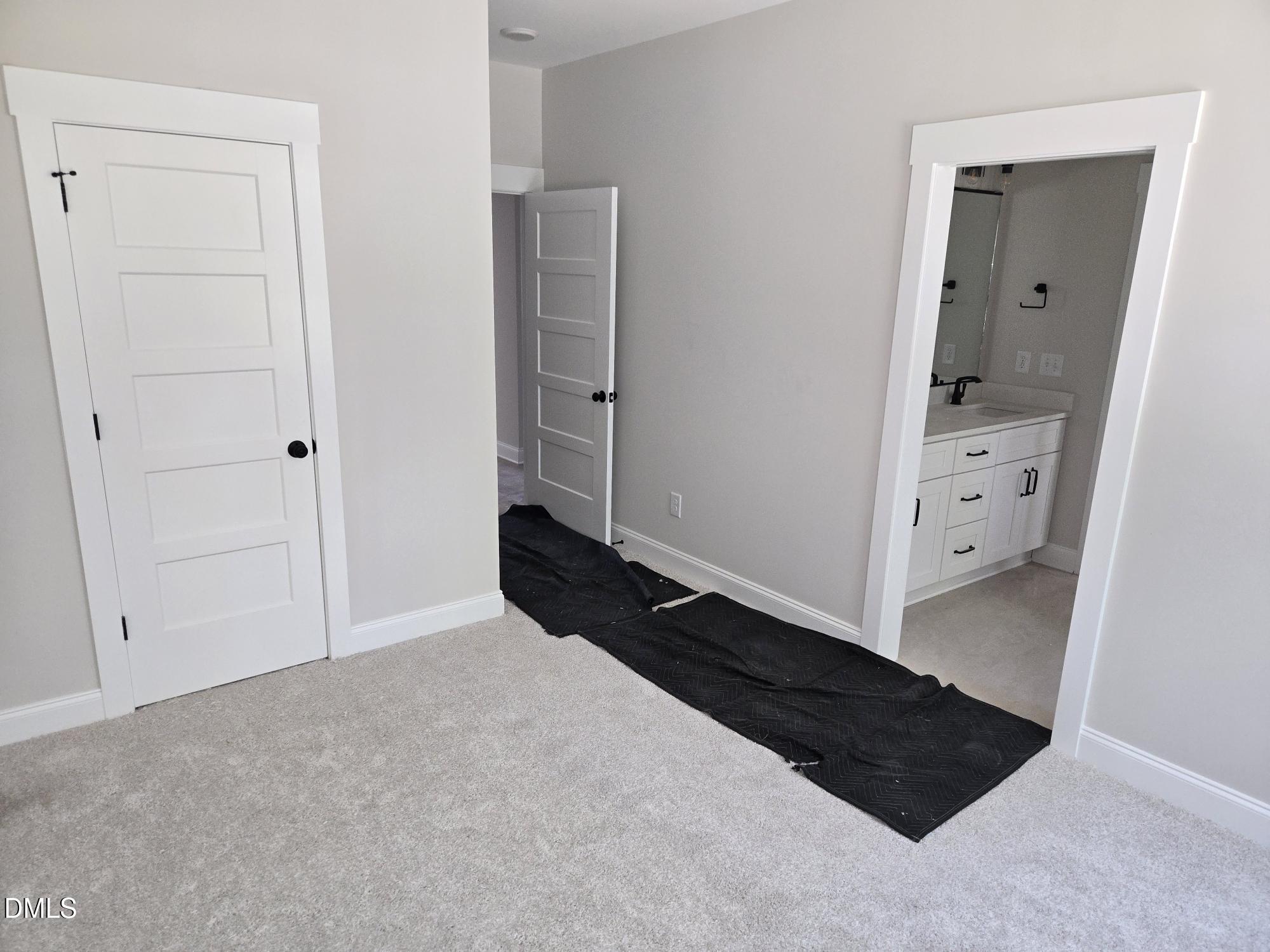 300 Avery Road Erwin, NC 28339 - Photo 13 of 38 a view of a closet area with mirror in it