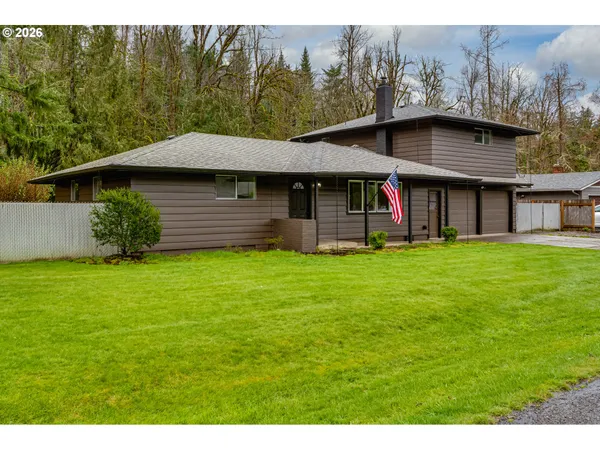 a view of a house with a garden
