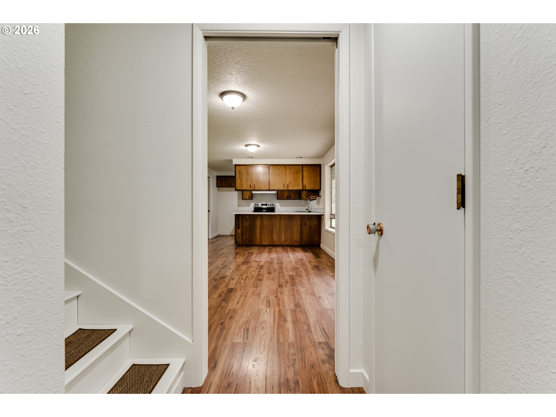 38730 Natures Garden Street Springfield, OR 97478 - Photo 13 of 37 a view of a living room with a wooden floor