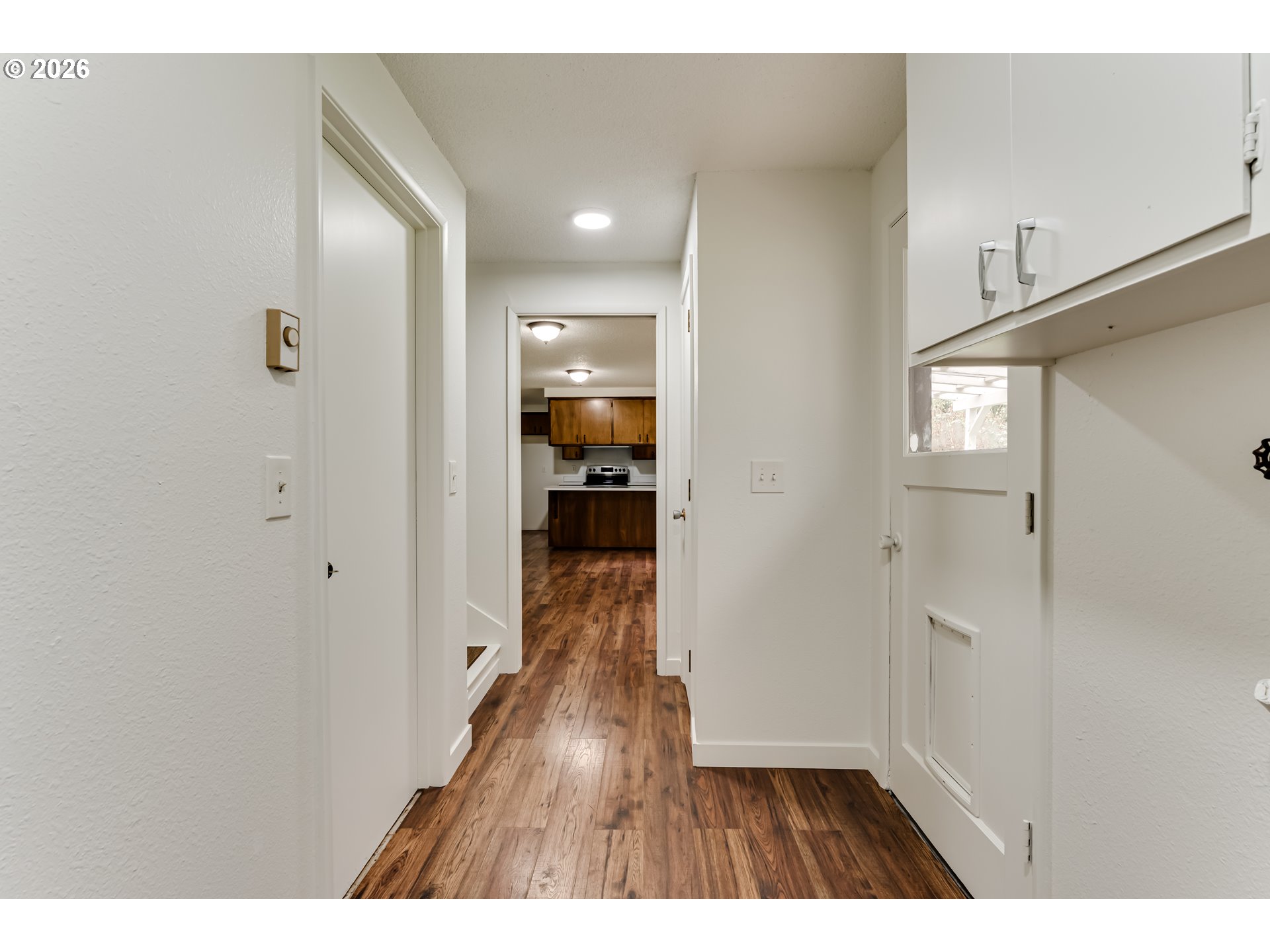 38730 Natures Garden Street Springfield, OR 97478 - Photo 15 of 37 a view of hallway with wooden floor