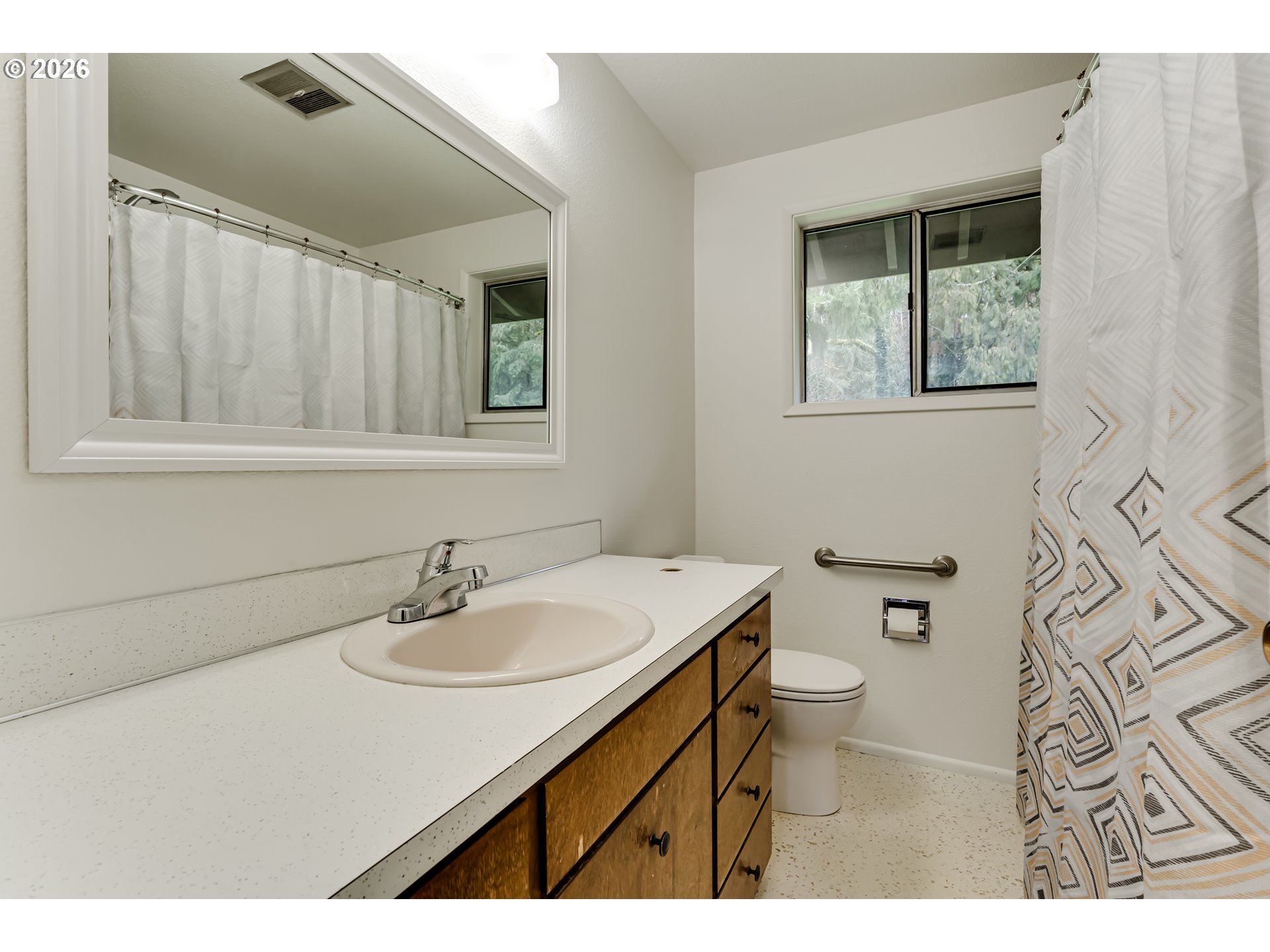 38730 Natures Garden Street Springfield, OR 97478 - Photo 19 of 37 a bathroom with a sink a toilet and a mirror