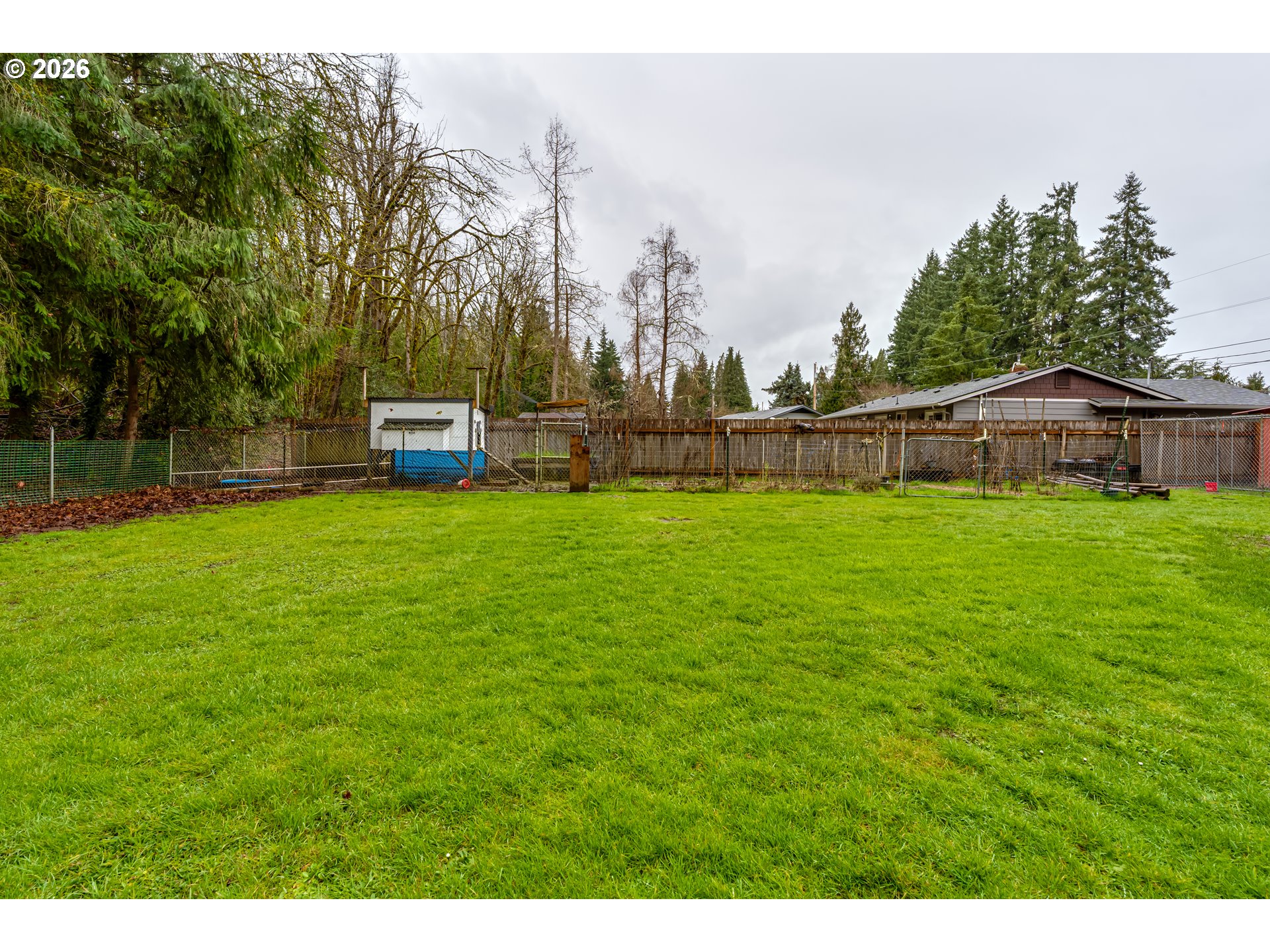 38730 Natures Garden Street Springfield, OR 97478 - Photo 33 of 37 a swimming pool with wooden fence
