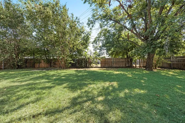 a view of a backyard with a garden