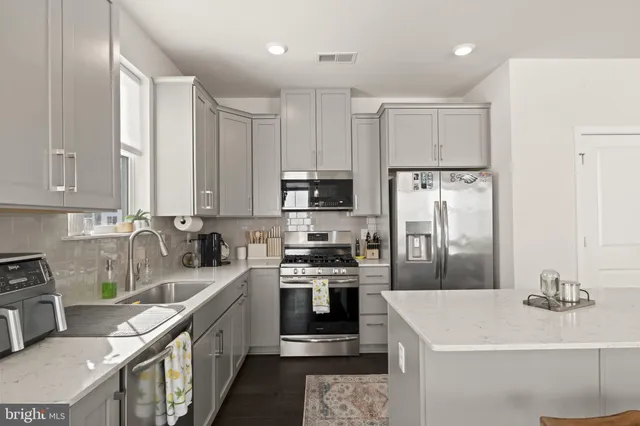 a view of a balcony with furniture