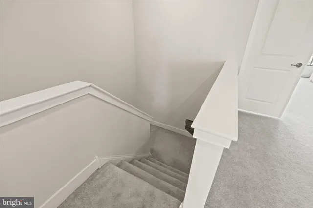 a view of a livingroom with furniture and windows