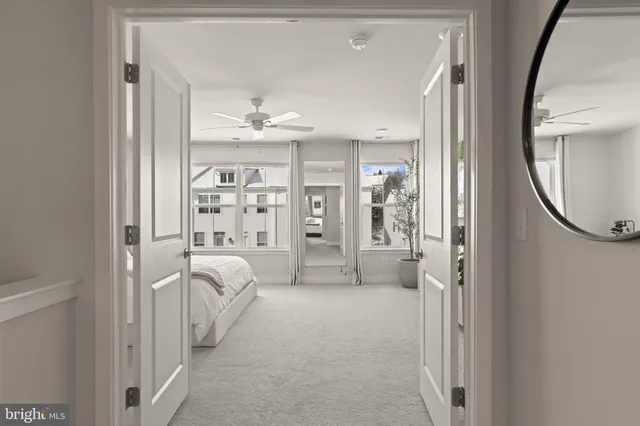 a bedroom with a bed and a couch