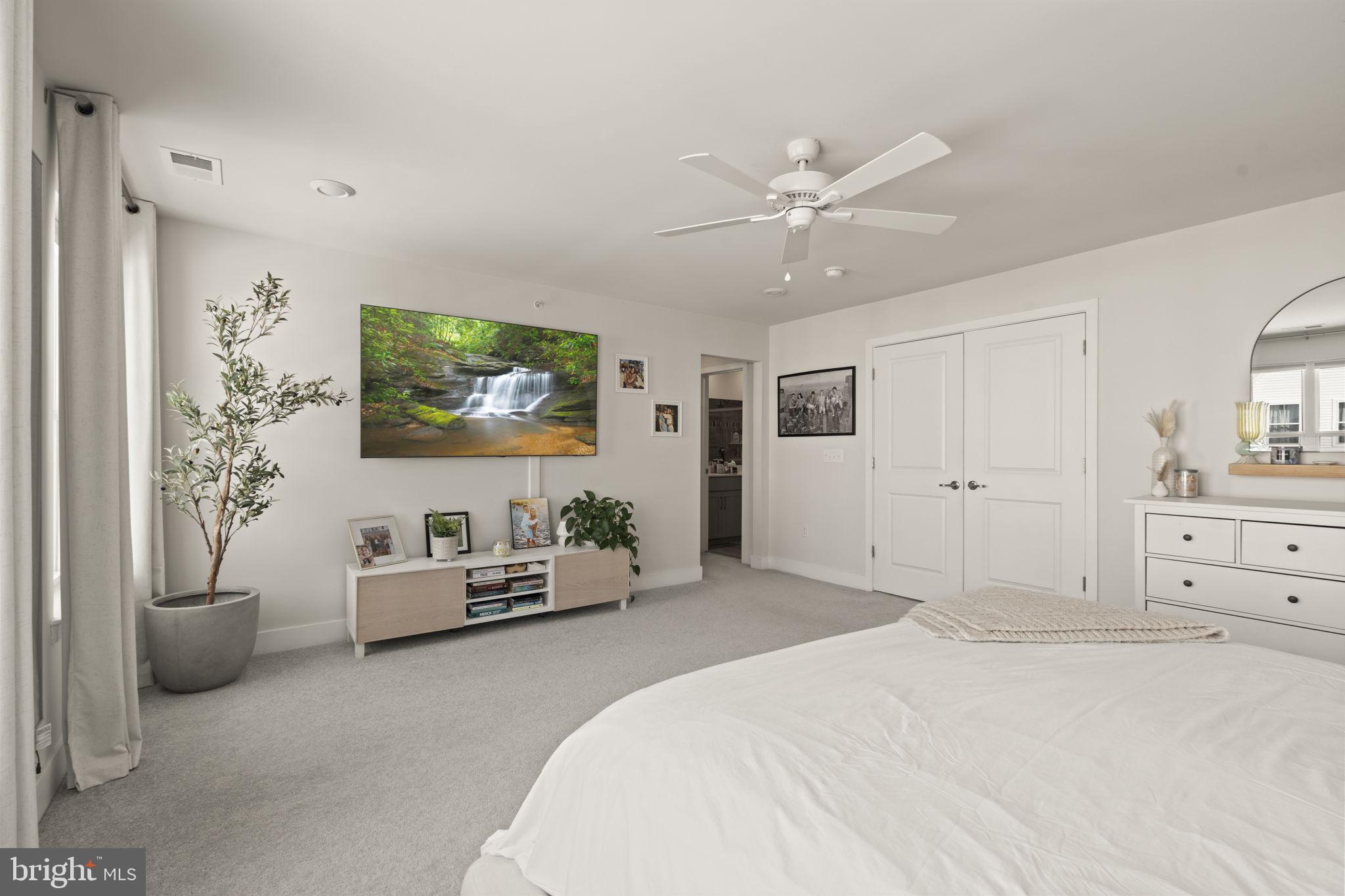917 Anvil Court Phoenixville, PA 19460 - Photo 21 of 34 a bedroom with a bed and a couch