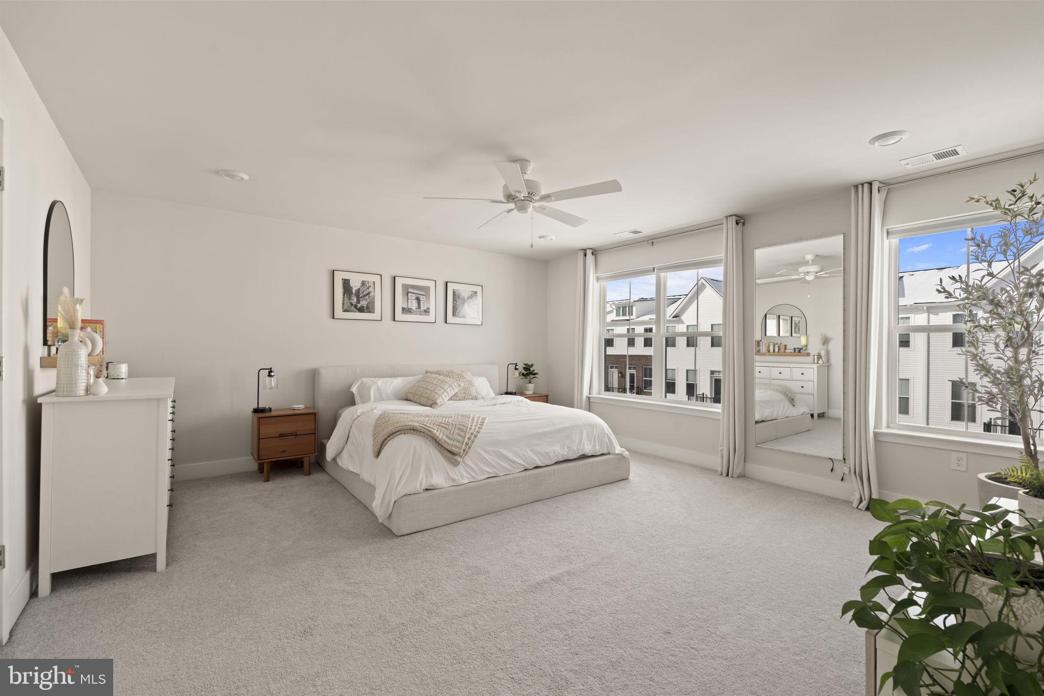 917 Anvil Court Phoenixville, PA 19460 - Photo 22 of 34 a spacious bedroom with a bed and a cabinets