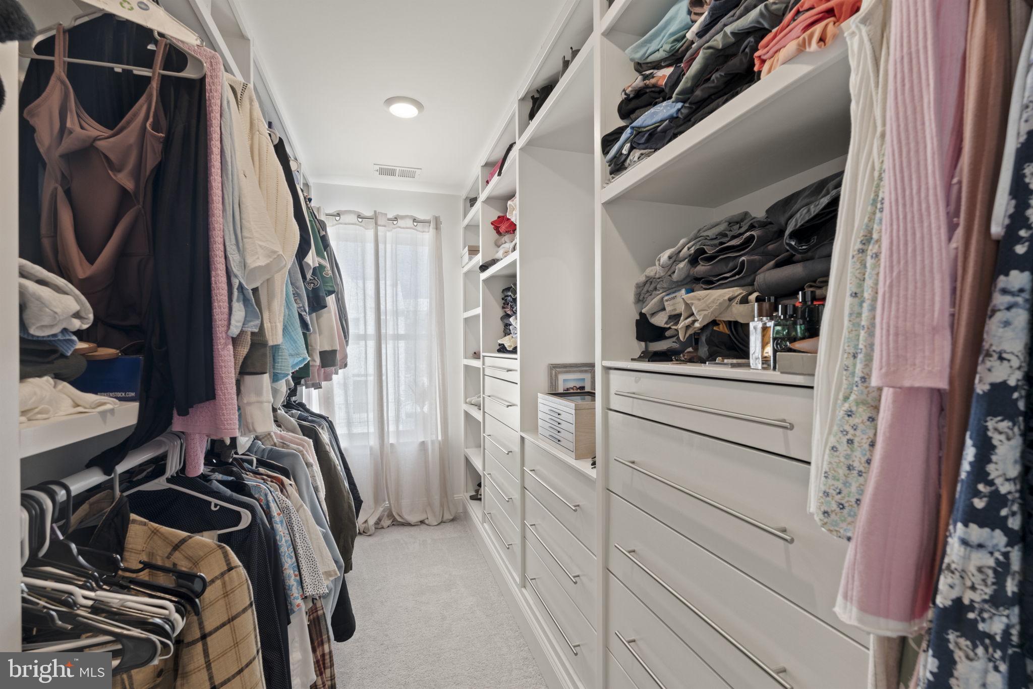 917 Anvil Court Phoenixville, PA 19460 - Photo 23 of 34 a view of walk in closet with clothes and shoes