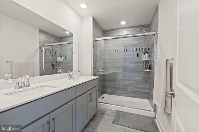 a view of a hallway with wooden shelves