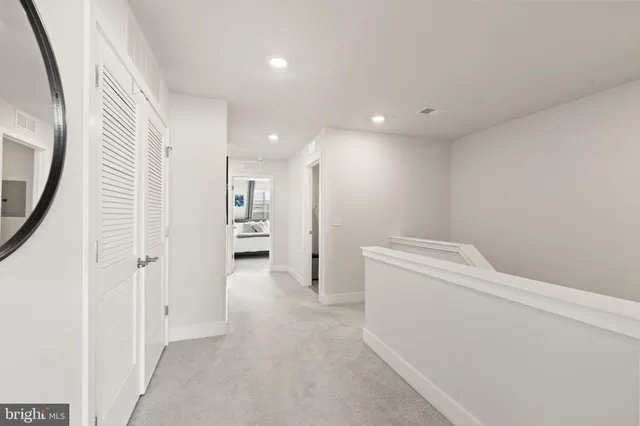 a bedroom with a workspace