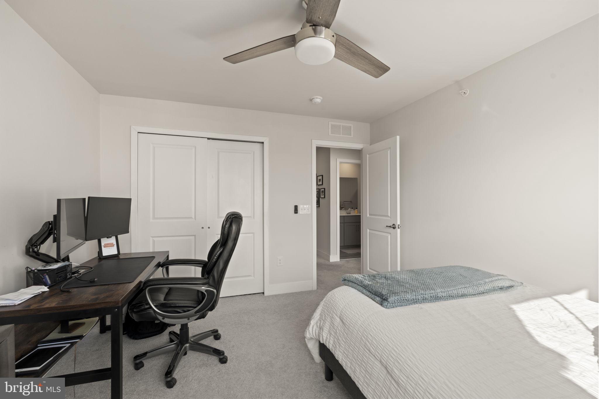 917 Anvil Court Phoenixville, PA 19460 - Photo 28 of 34 a bedroom with a workspace