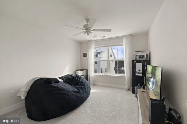 a bathroom with a shower and a toilet