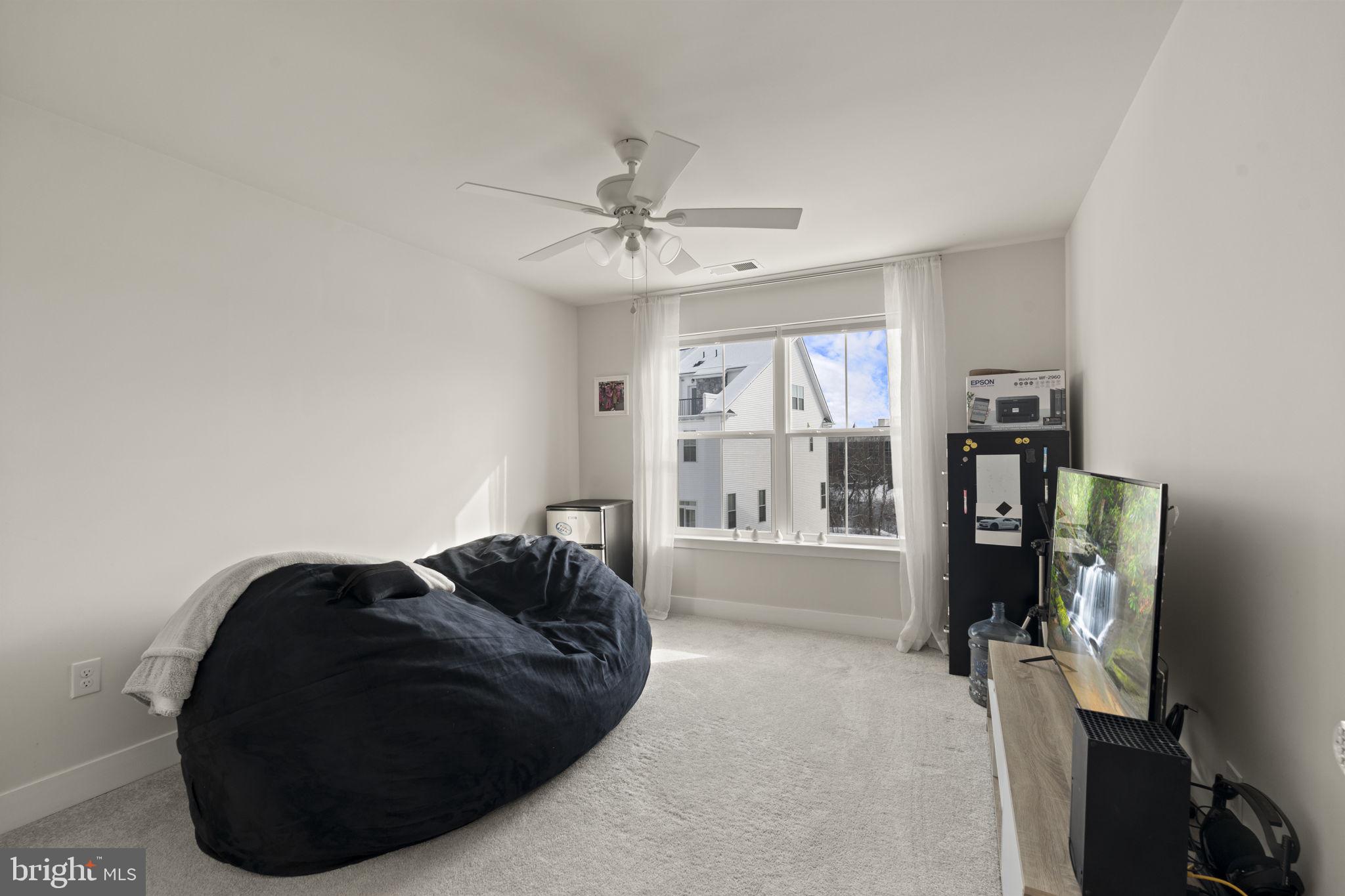 917 Anvil Court Phoenixville, PA 19460 - Photo 29 of 34 a living room with furniture and a window