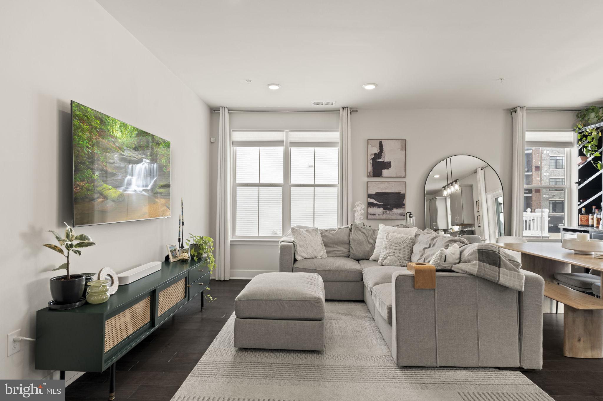 917 Anvil Court Phoenixville, PA 19460 - Photo 6 of 34 a living room with furniture and a flat screen tv