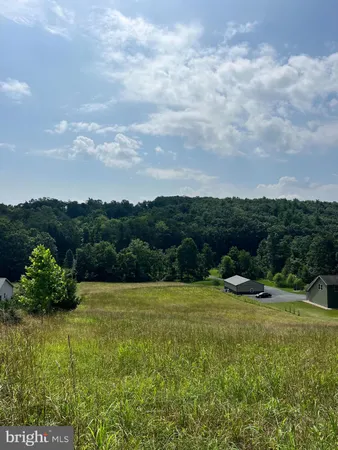 a view of outdoor space with mountain view