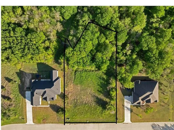 a balcony with table and chairs