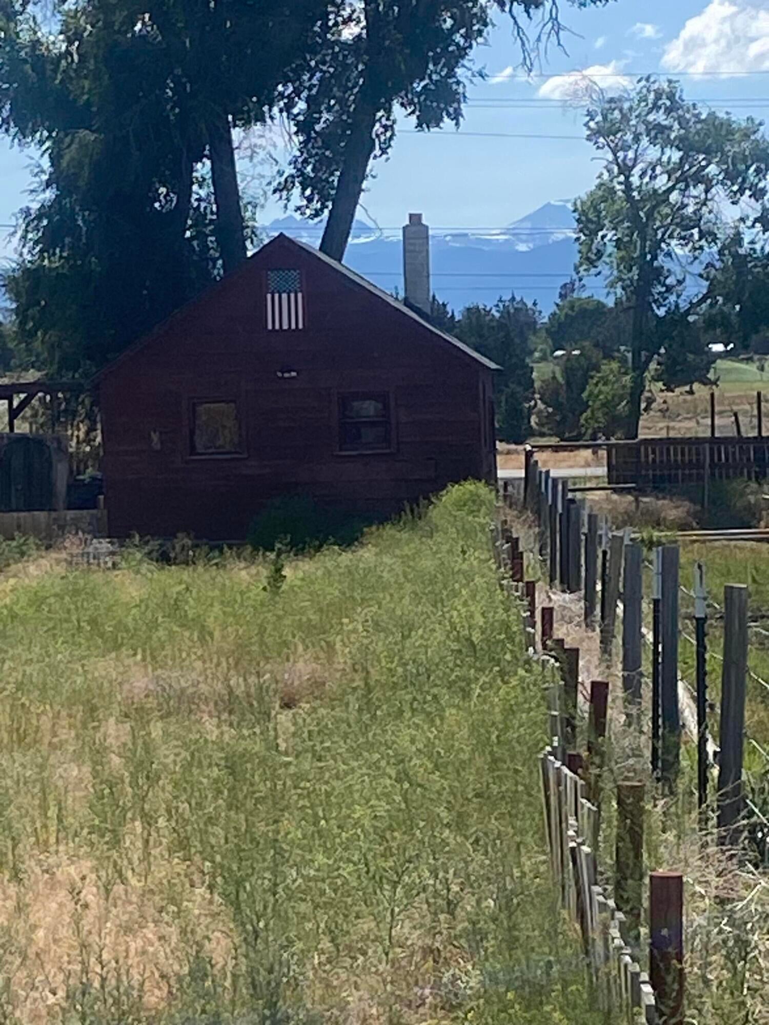 21652 Northeast Butler Market Road Bend, OR 97701 - Photo 28 of 31 Fence line with large farmland
