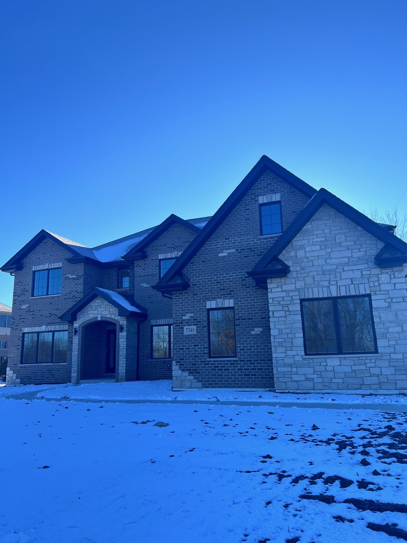a house view with a outdoor space