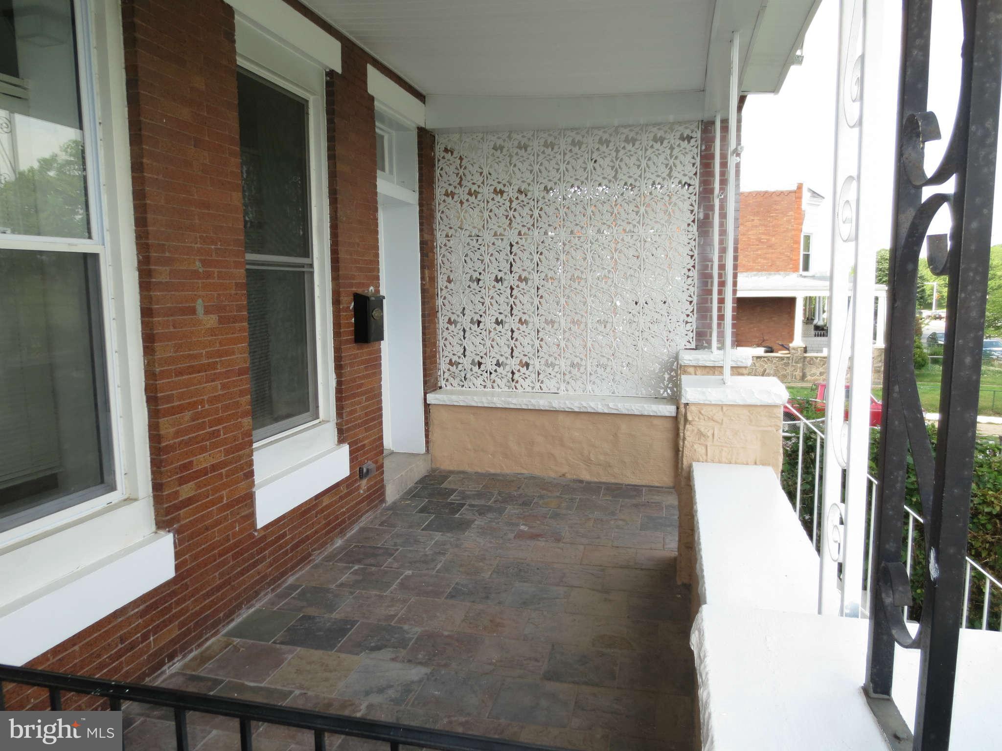 3030 Harford Road Baltimore, MD 21218 - Photo 22 of 23 Great porch with view of golf course