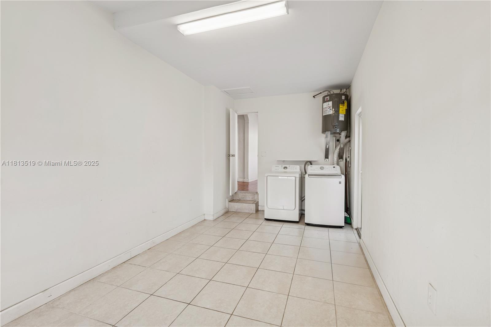 2350 Southwest 26th Street Miami, FL 33133 - Photo 18 of 20 laundry in converted garage