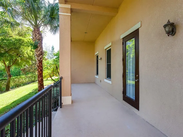 a view of outdoor space with garden and seating area