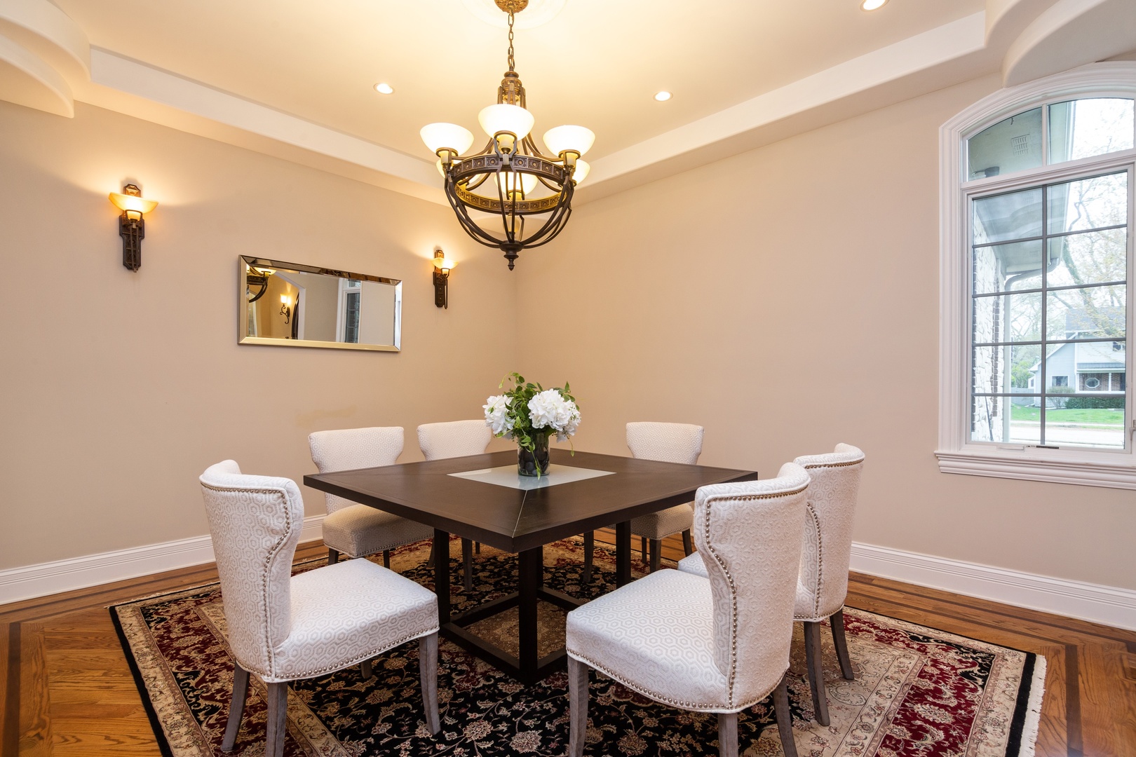 2283 Scott Road Northbrook, IL 60062 - Photo 12 of 33 a view of a dining room with furniture a chandelier and wooden floor