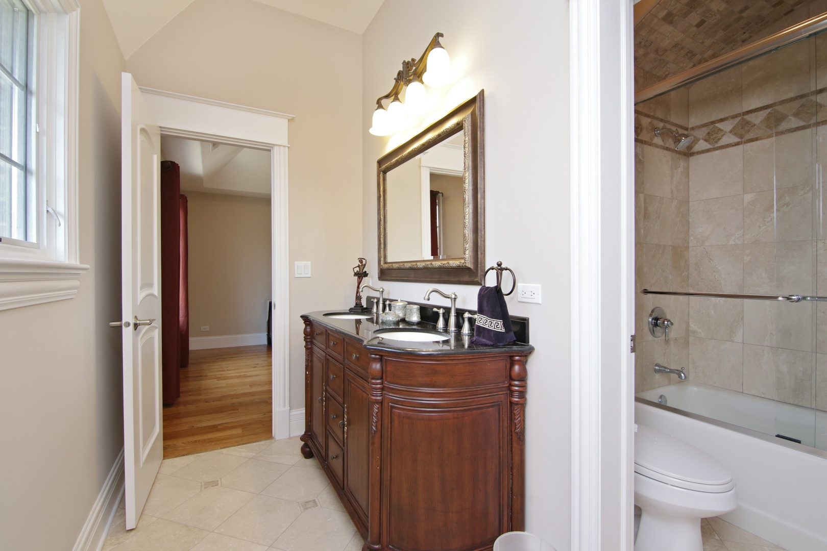 2283 Scott Road Northbrook, IL 60062 - Photo 23 of 33 a bathroom with a granite countertop sink toilet and shower