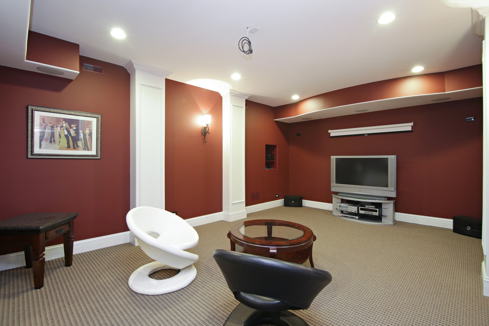 2283 Scott Road Northbrook, IL 60062 - Photo 27 of 33 a living room with furniture a rug and a projector