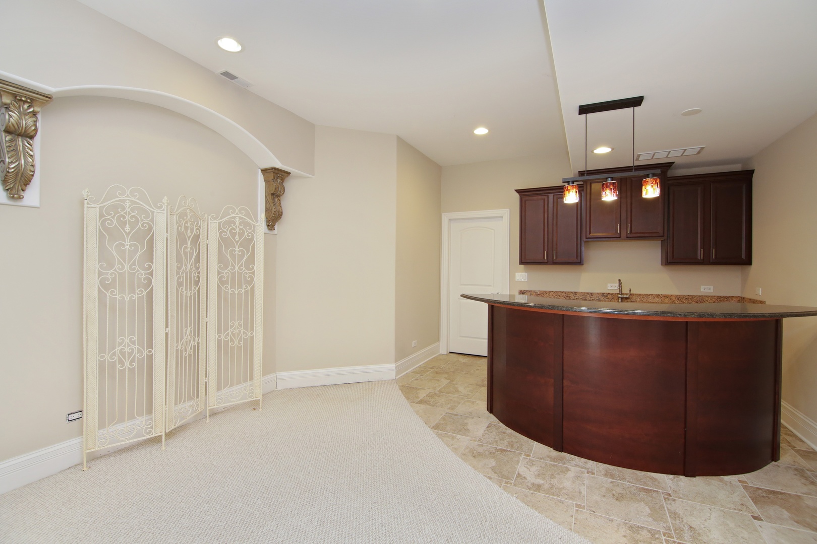 2283 Scott Road Northbrook, IL 60062 - Photo 29 of 33 a view of kitchen island granite countertop wooden cabinets and a sink
