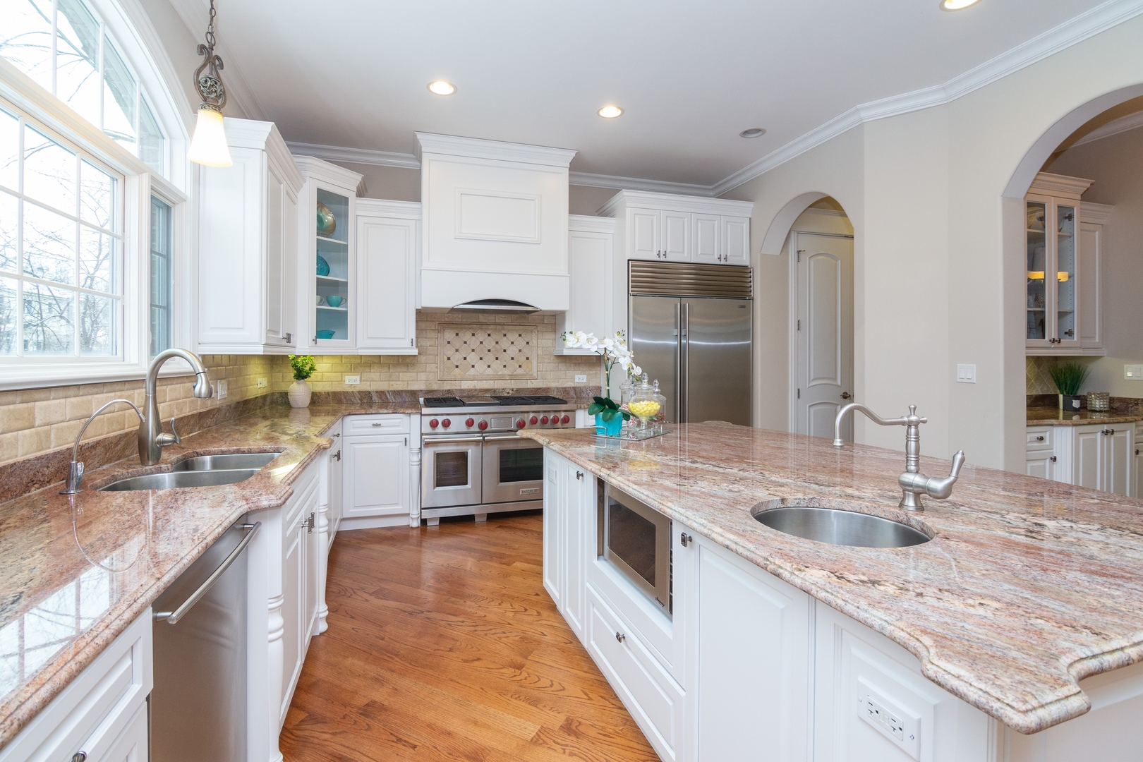 2283 Scott Road Northbrook, IL 60062 - Photo 8 of 33 a large kitchen with stainless steel appliances granite countertop a sink stove and cabinets