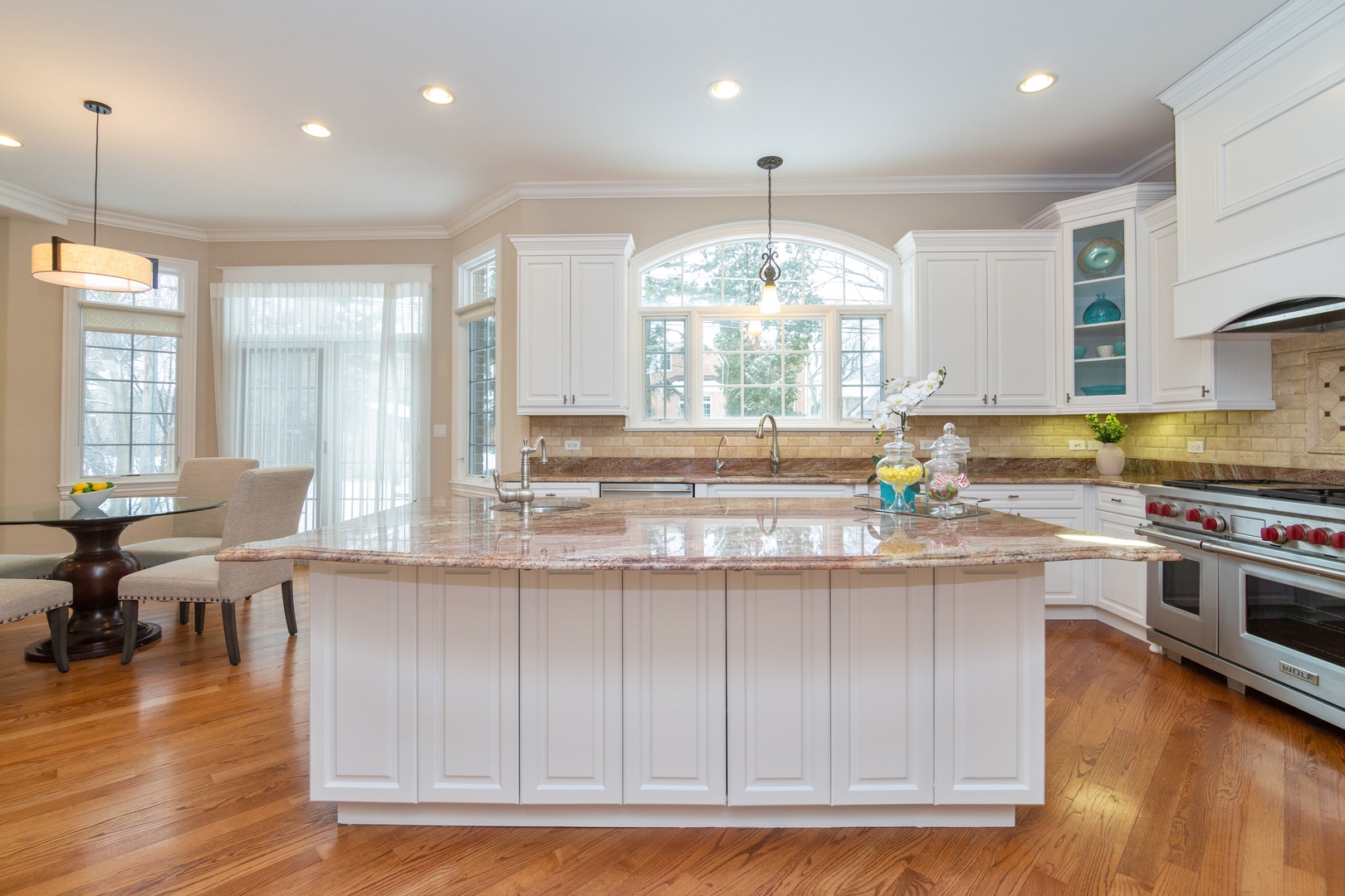 2283 Scott Road Northbrook, IL 60062 - Photo 9 of 33 a kitchen with stainless steel appliances granite countertop a sink a stove and a wooden floors