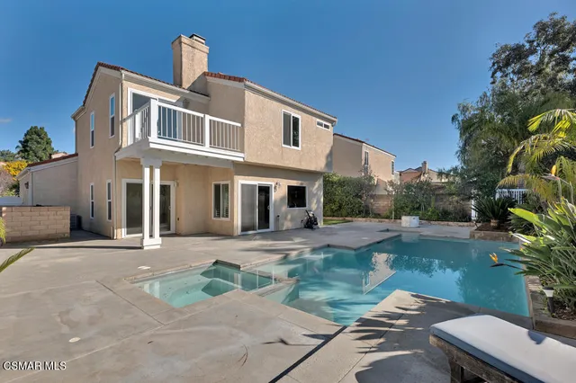 a house view with a outdoor space