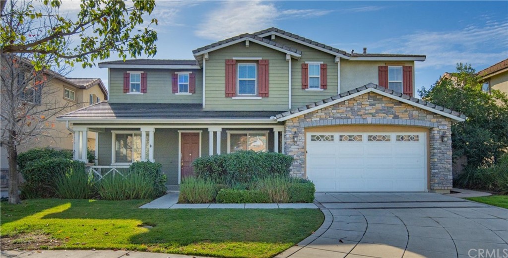 12817 Crestfield Court Rancho Cucamonga, CA 91739 - Photo 1 of 1 a front view of a house with a yard and garage