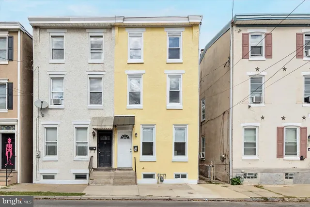 a front view of a building with street