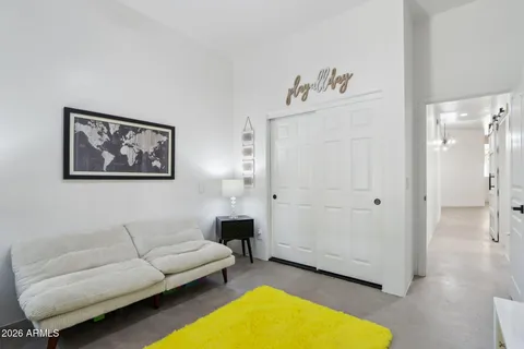 a living room with furniture and a window