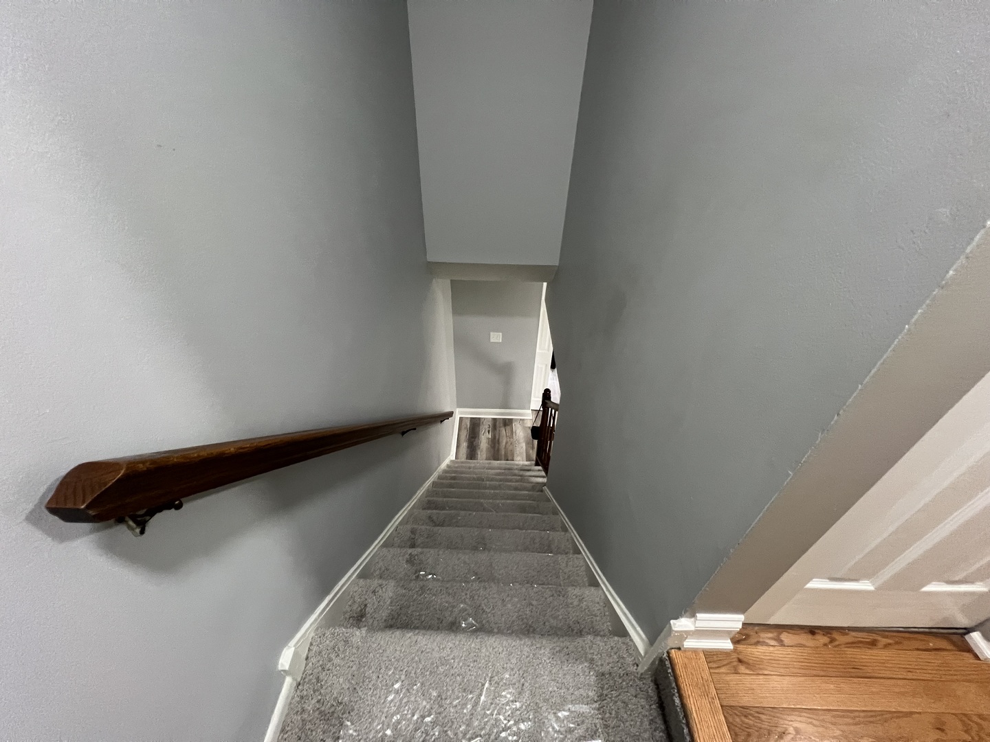 1067 Cascade Drive Aurora, IL 60506 - Photo 11 of 20 a view of entryway and hall with wooden floor