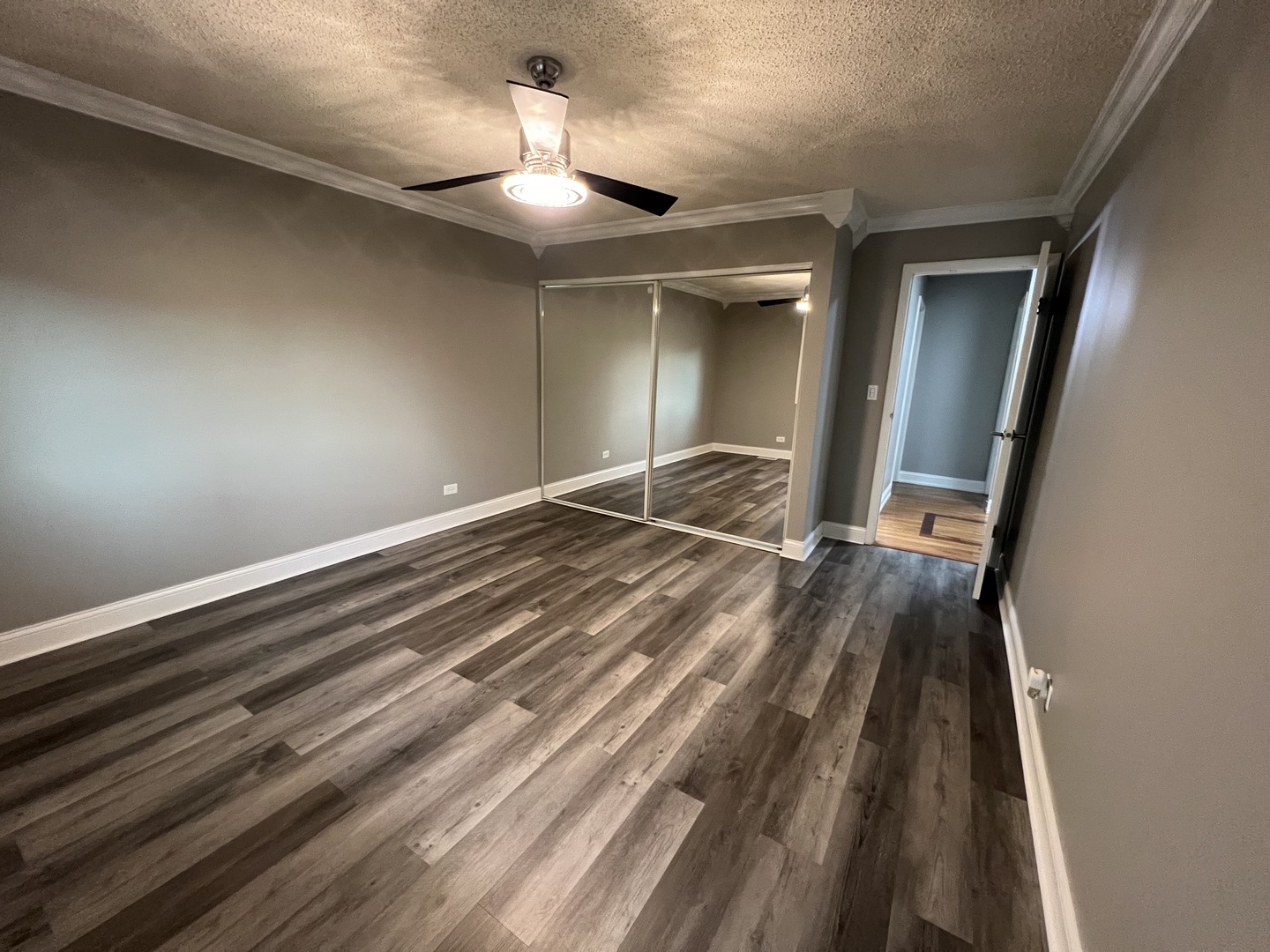 1067 Cascade Drive Aurora, IL 60506 - Photo 14 of 20 wooden floor in an empty room