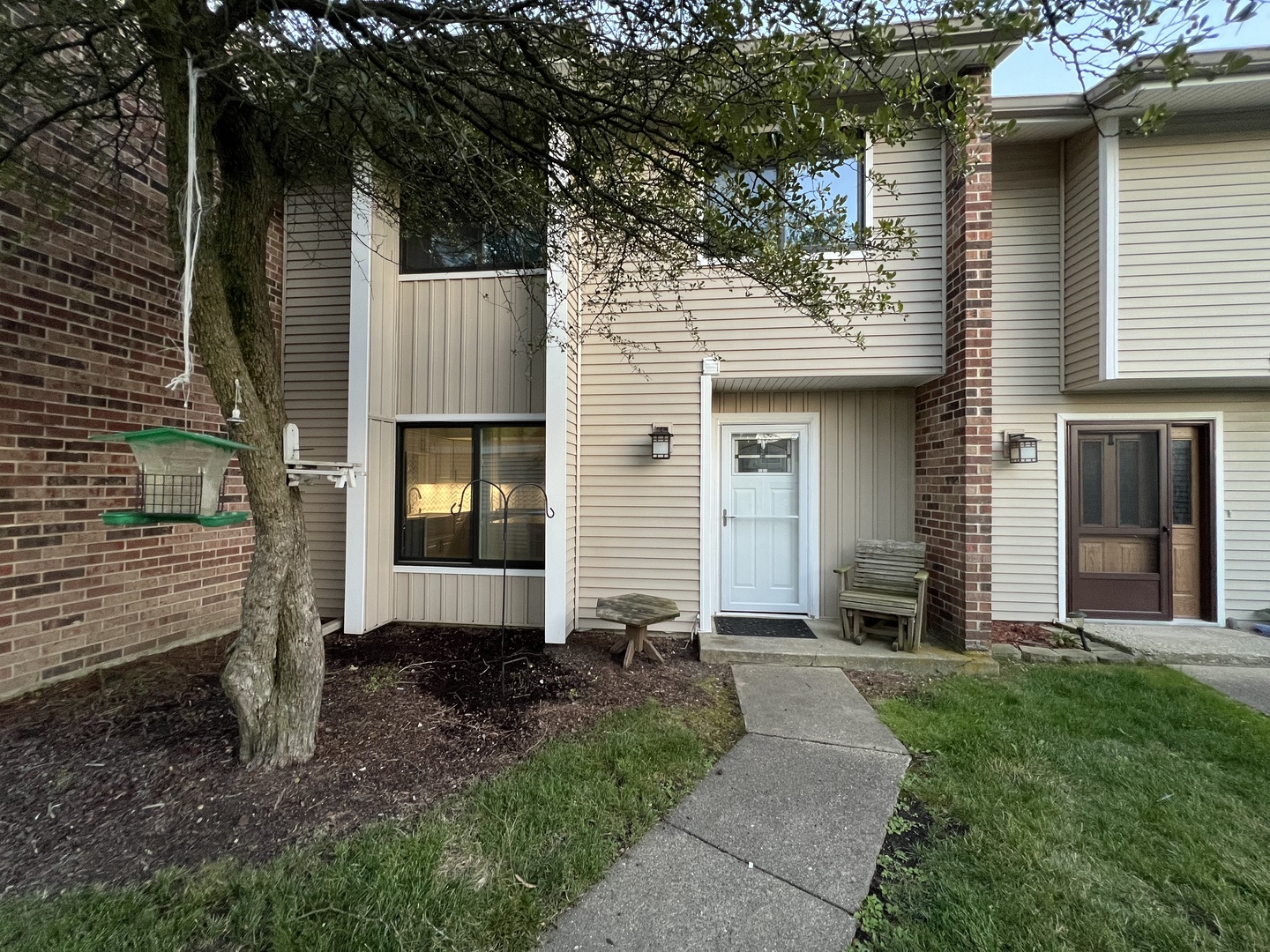 1067 Cascade Drive Aurora, IL 60506 - Photo 2 of 20 a view of a house with backyard and garden