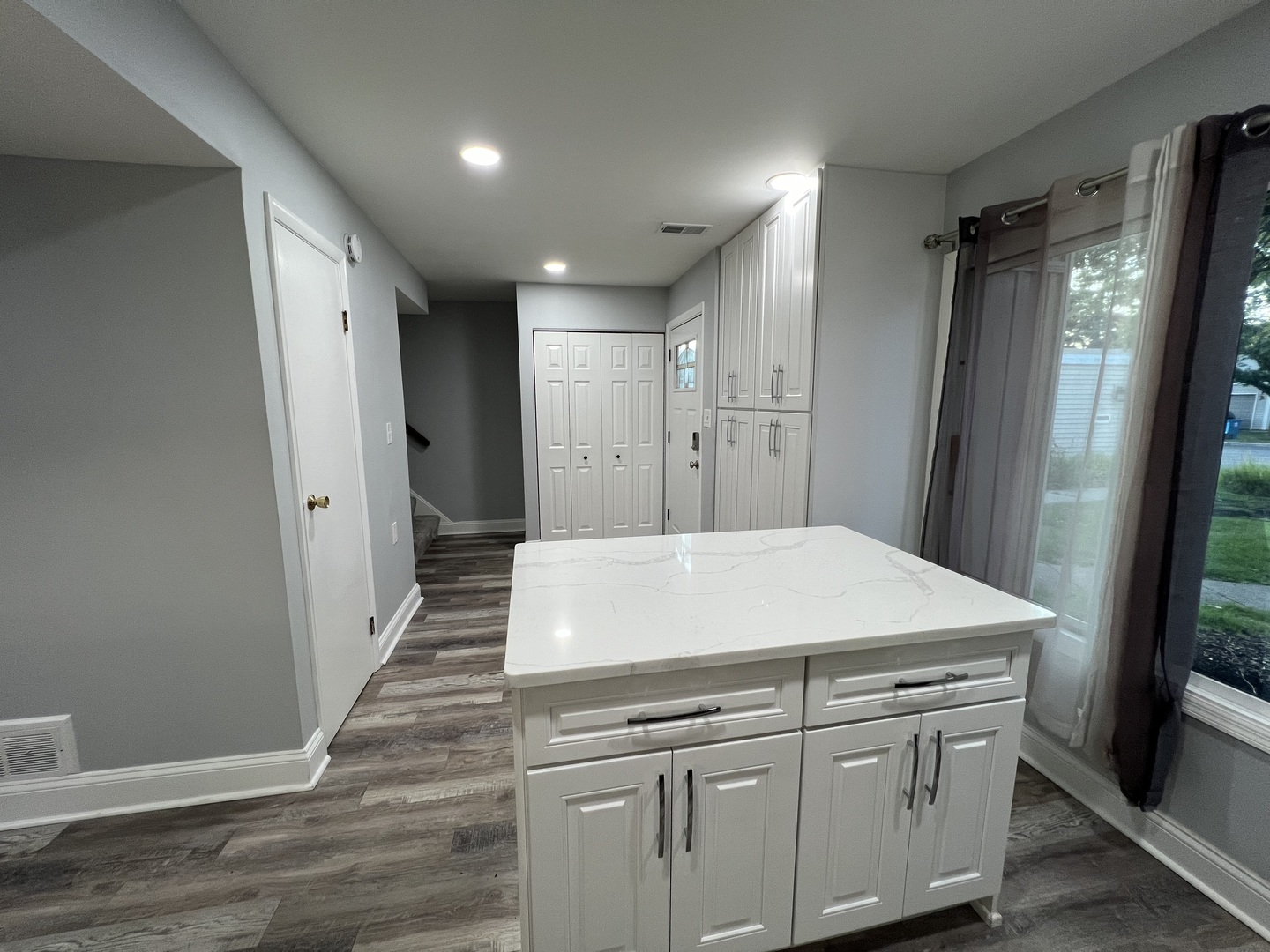 1067 Cascade Drive Aurora, IL 60506 - Photo 7 of 20 a kitchen with white cabinets and refrigerator