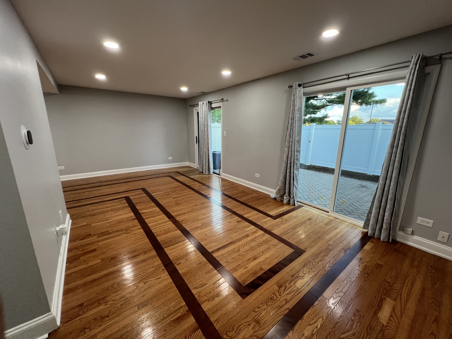 1067 Cascade Drive Aurora, IL 60506 - Photo 9 of 20 a view of a room with wooden floor