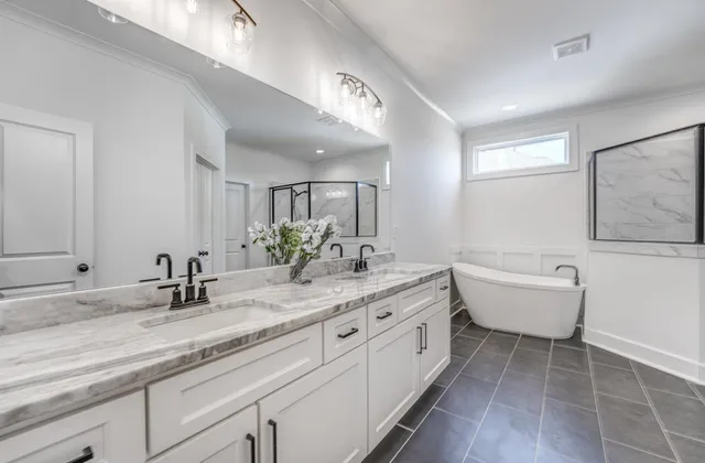 a bedroom with furniture and a wooden floor
