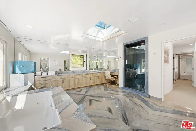 a living room with a couch and a view of living room