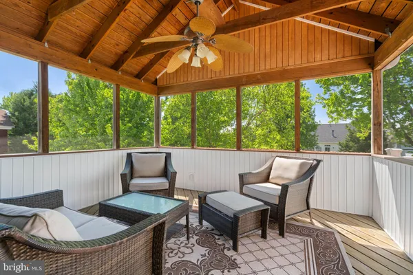 a outdoor living space with furniture and garden view