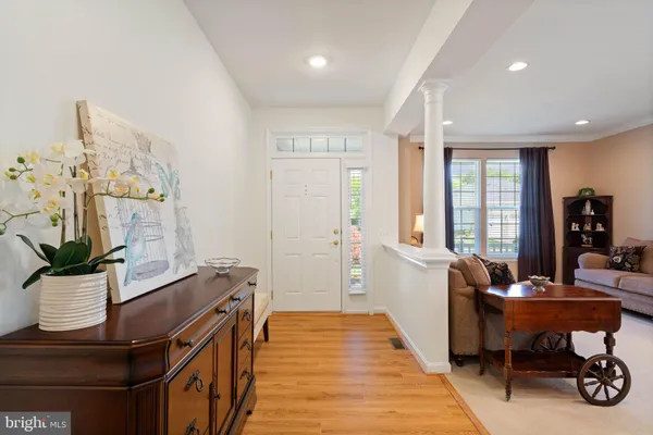 a room with furniture and wooden floor