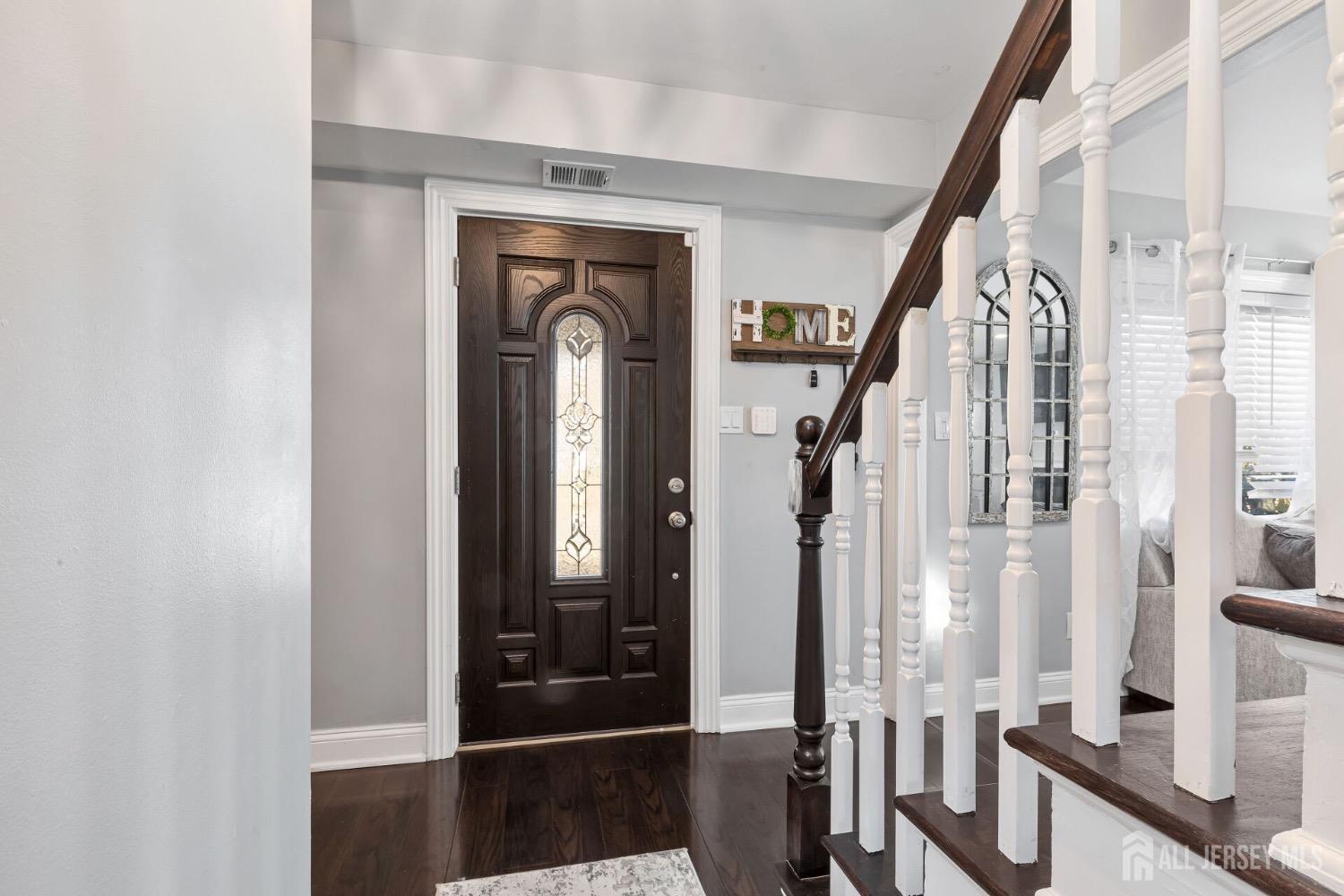 4 Indiana Road Somerset, NJ 08873 - Photo 4 of 31 a view of an entryway with wooden floor