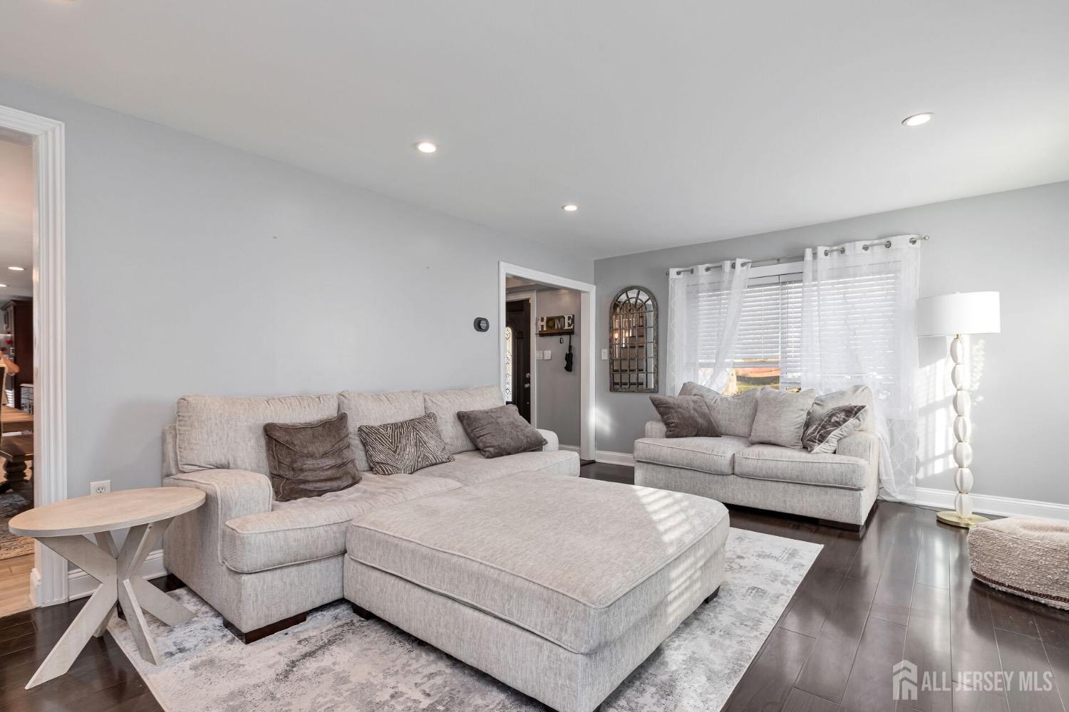 4 Indiana Road Somerset, NJ 08873 - Photo 7 of 31 a living room with furniture and a couch