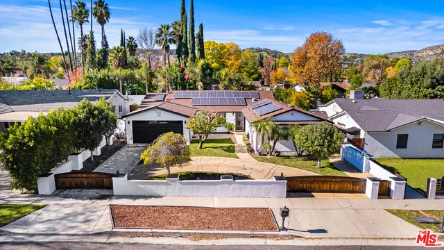 a view of houses with an outdoor space and lakeside