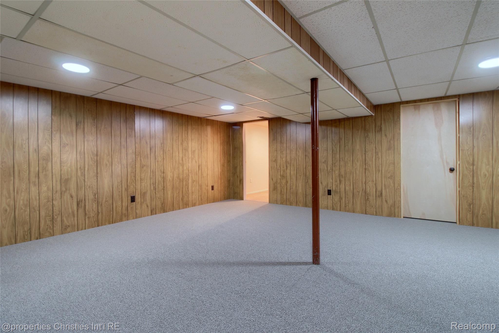 565 Center Ridge South Lyon, MI 48178 - Photo 22 of 37 Finished basement family room area