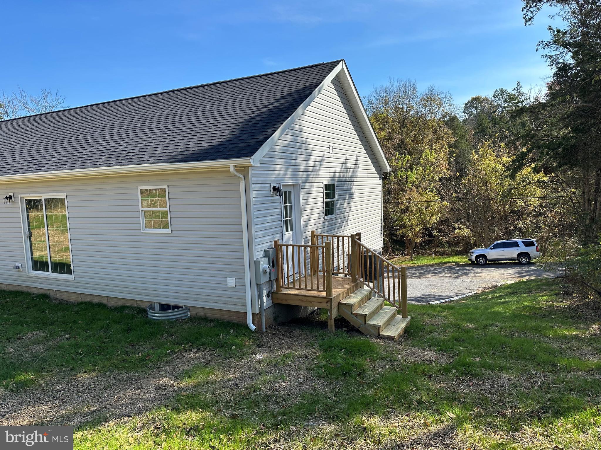 485 Toll House Road Maurertown, VA 22644 - Photo 15 of 18 a view of backyard with a garden and deck